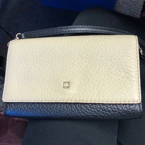 Kate Spade, Black and Tan mini cross body bag.